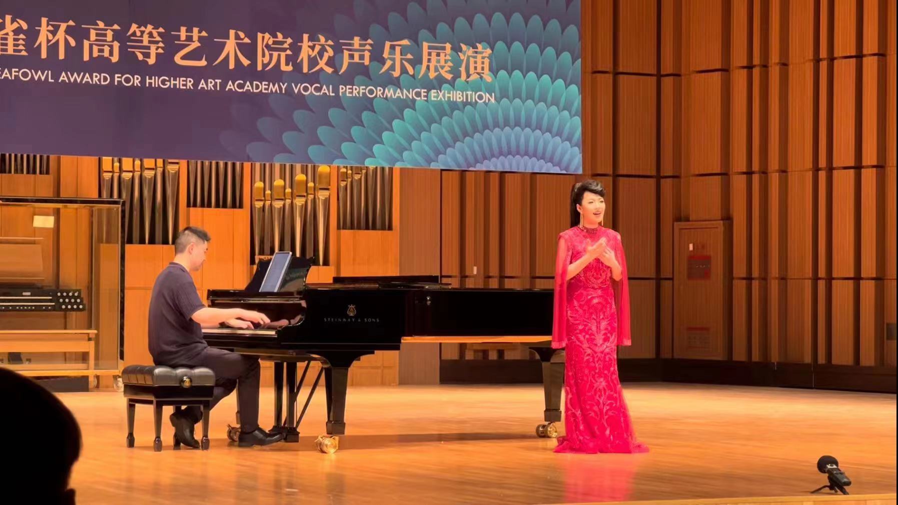 湖南文理学院学子首获全国高等艺术院校声乐展演银孔雀杯奖.jpg